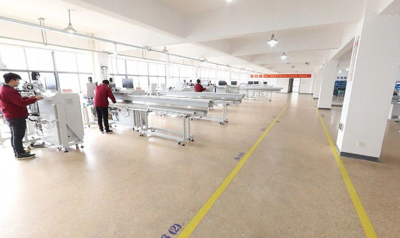 Zhejiang Junquan Automation Co., Ltd. linea di produzione del fabbricante